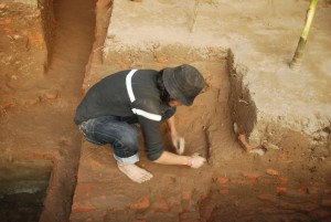 9. A student is seen to work in a trench